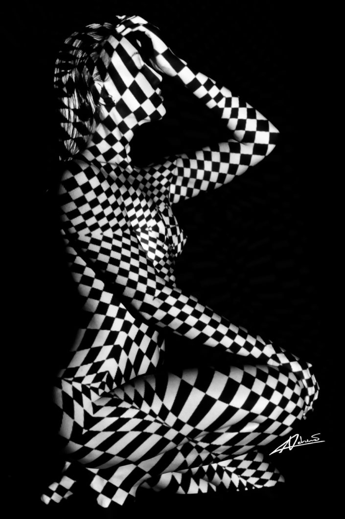 Projections-nude photography woman sitting with black and white rectangles picture.