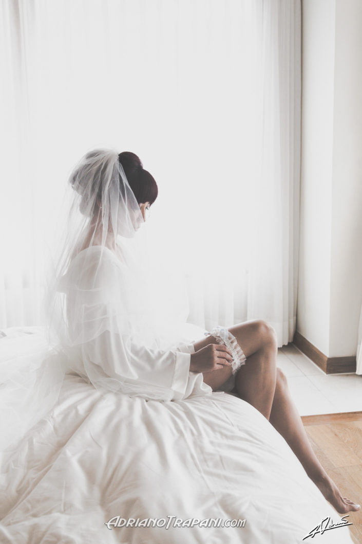 Wedding photography bride boudoir wearing garter.